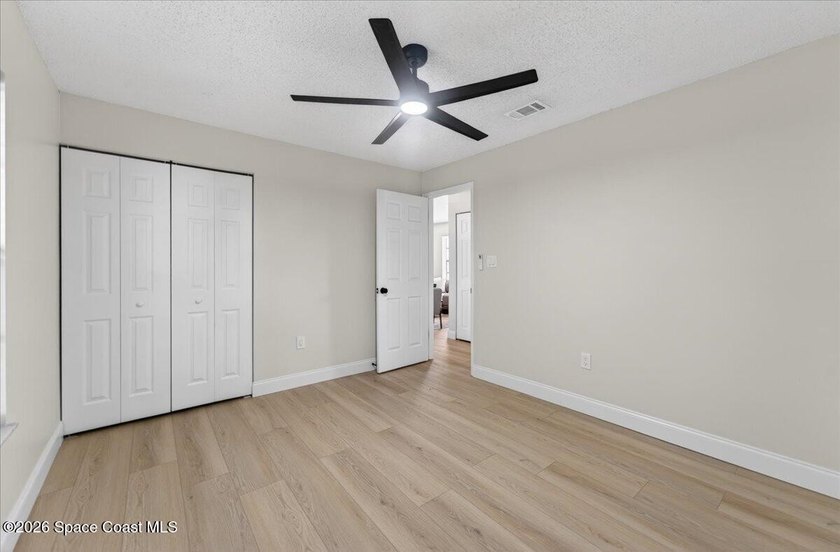 Welcome home to this charming 3-bedroom, 2-bath residence with a - photo 21