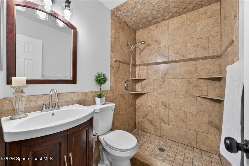 Welcome home to this charming 3-bedroom, 2-bath residence with a - photo 22