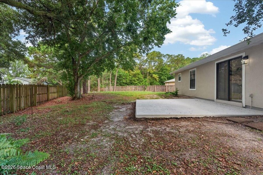 Welcome home to this charming 3-bedroom, 2-bath residence with a - photo 30
