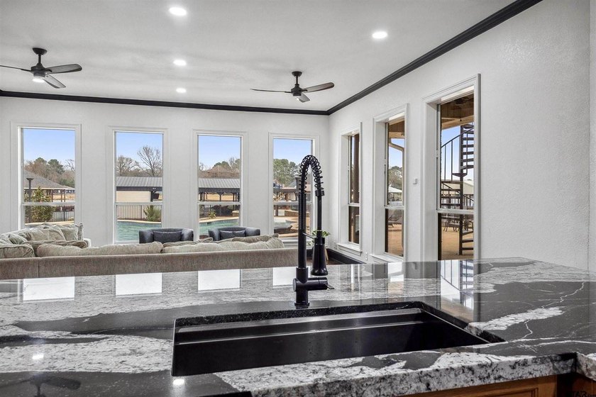 Stunning 5,776 sq.ft. lake-front home on beautifully landscaped - photo 16