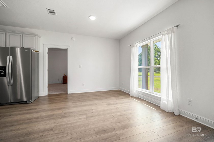 Nestled on nearly three acres of pristine land in Fairhope, this - photo 17