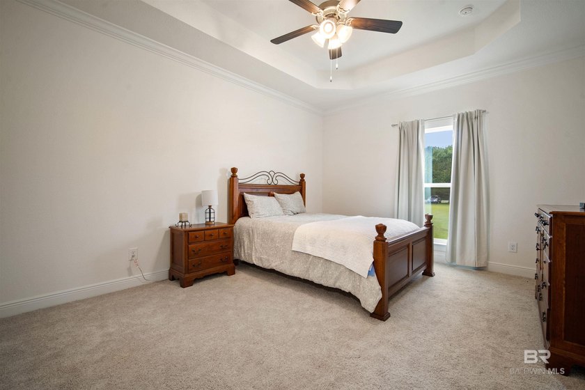 Nestled on nearly three acres of pristine land in Fairhope, this - photo 21