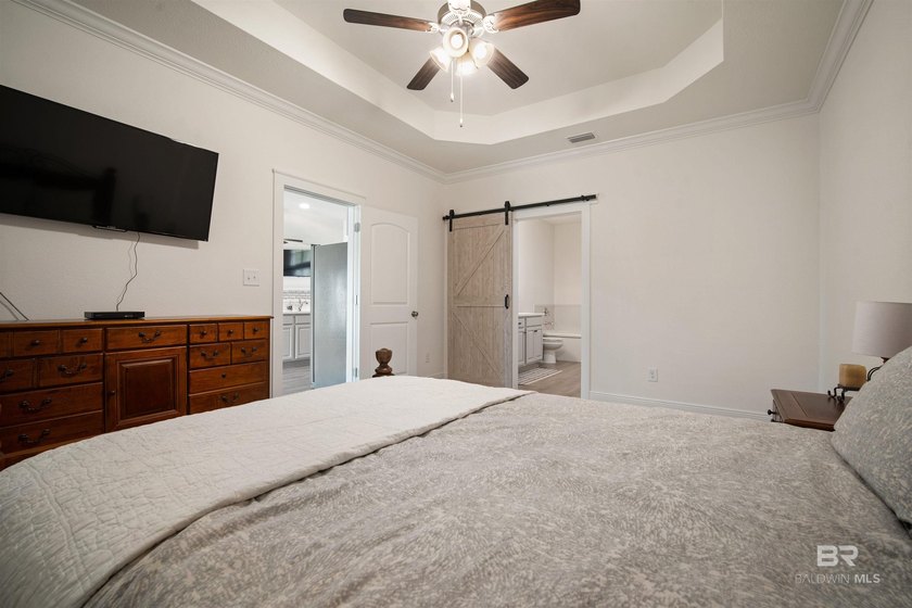 Nestled on nearly three acres of pristine land in Fairhope, this - photo 22