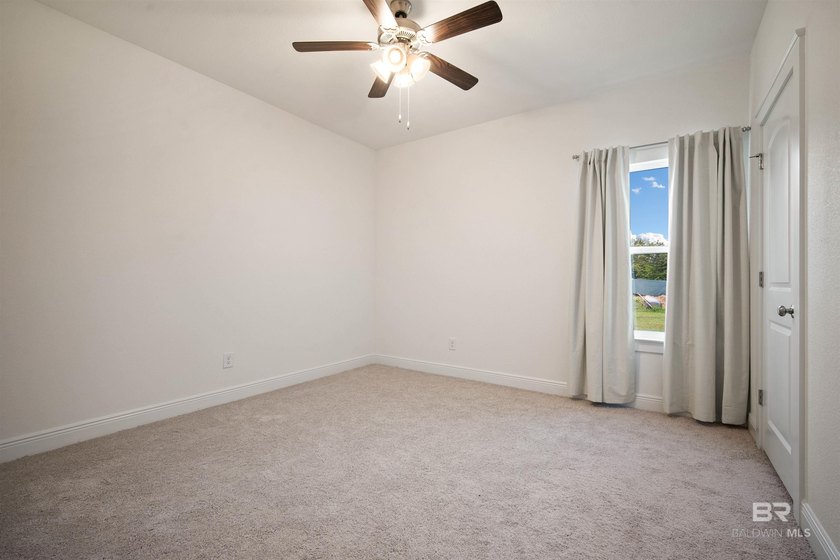Nestled on nearly three acres of pristine land in Fairhope, this - photo 28