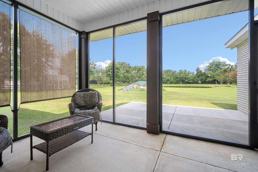 Nestled on nearly three acres of pristine land in Fairhope, this - photo 31