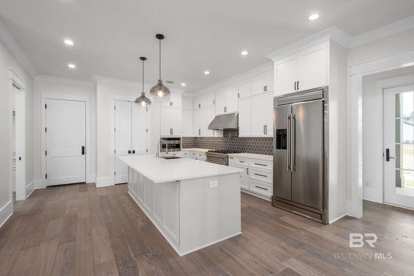 Located within the beautiful, gated Waterways community, this - photo 8