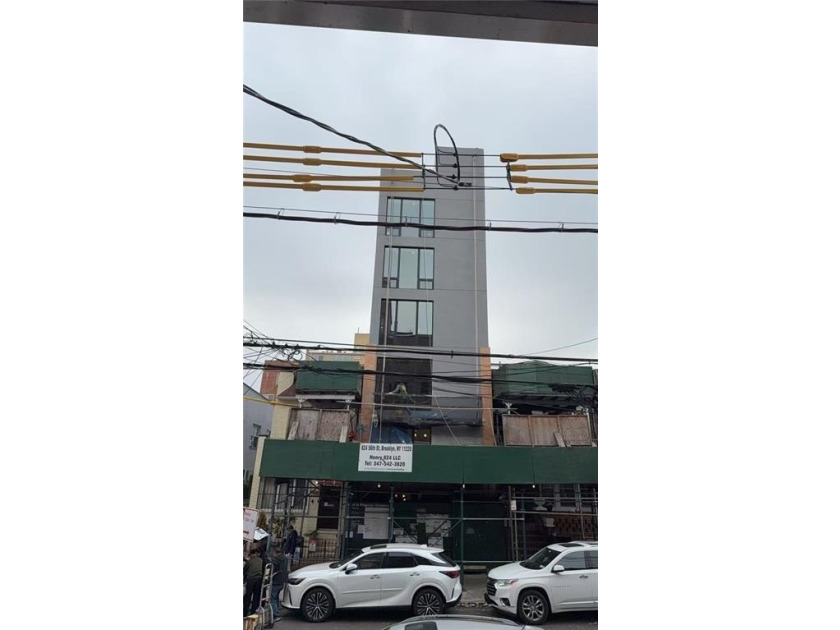 The building is newly renovated with R6 Zoning. Ideal for use as - photo 2