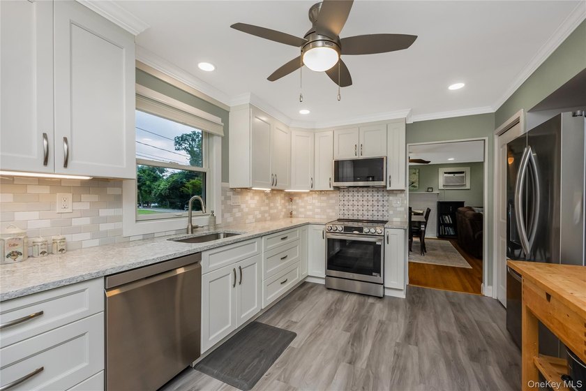 Beautifully Maintained and Updated 2 Bedroom Ranch with Open - photo 12
