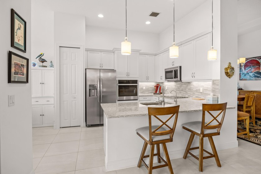 Welcome to 23018 SW Accesi Way, in PGA Verano. This large - photo 12