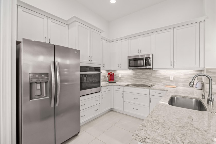 Welcome to 23018 SW Accesi Way, in PGA Verano. This large - photo 14