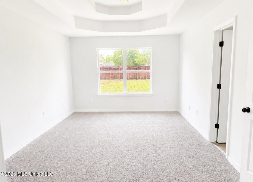 This beautifully updated 4-bedroom, 2-bath home is located in a - photo 11