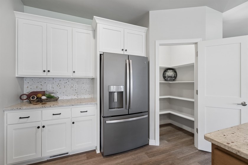 Impressive ranch! As you enter the open-concept design welcomes - photo 11