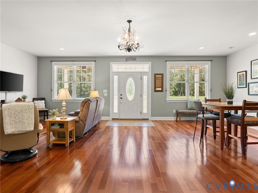 Custom-built and situated on 3.42 private wooded acres, this - photo 15