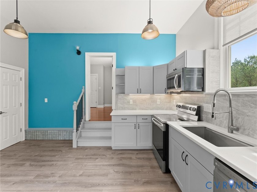 Custom-built and situated on 3.42 private wooded acres, this - photo 42