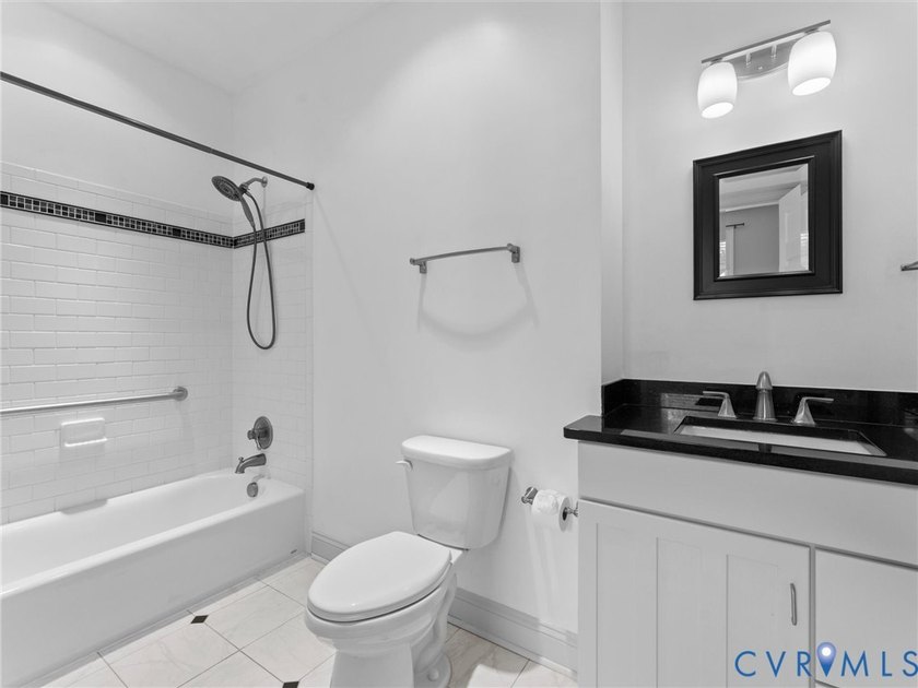 Custom-built and situated on 3.42 private wooded acres, this - photo 45