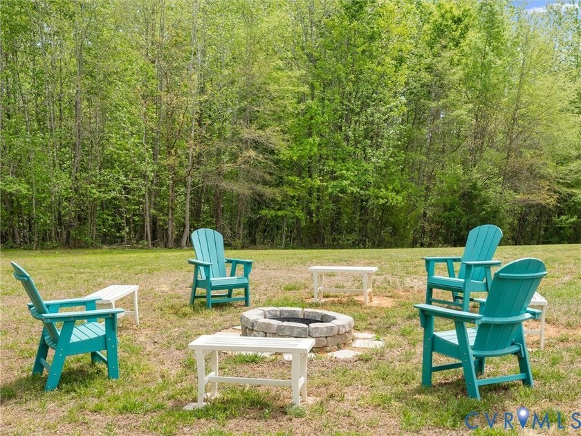 Custom-built and situated on 3.42 private wooded acres, this - photo 46
