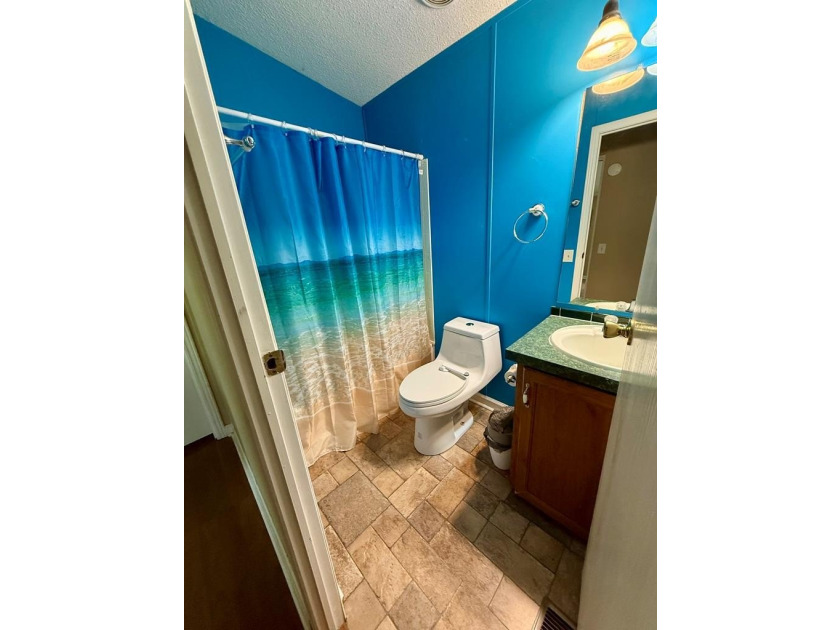 Rest and relax in this beautifully maintained 3-bedroom, 2-bath - photo 21