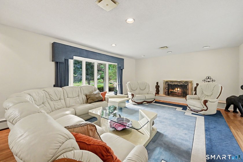 Tucked away on a quiet, tree-lined street in North Stamford - photo 4