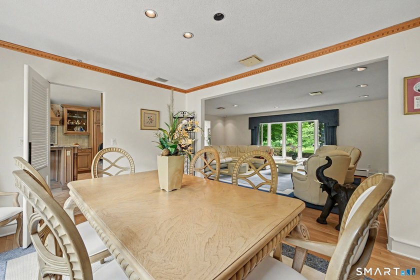 Tucked away on a quiet, tree-lined street in North Stamford - photo 8