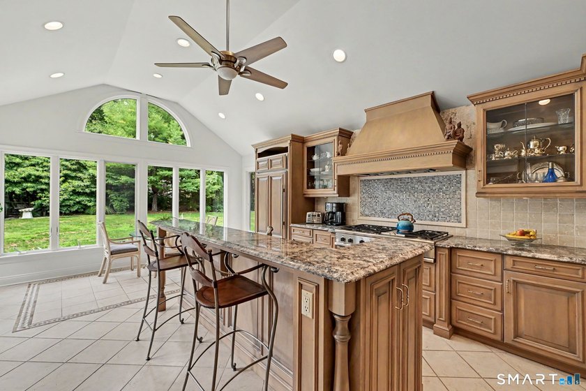 Tucked away on a quiet, tree-lined street in North Stamford - photo 10