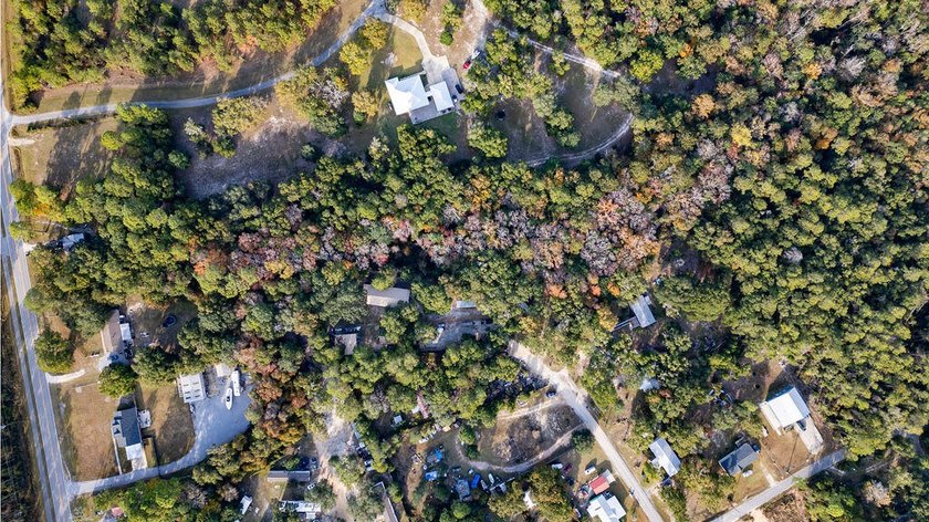 large lot just under an acre. lot comes with one septic tank and - photo 8