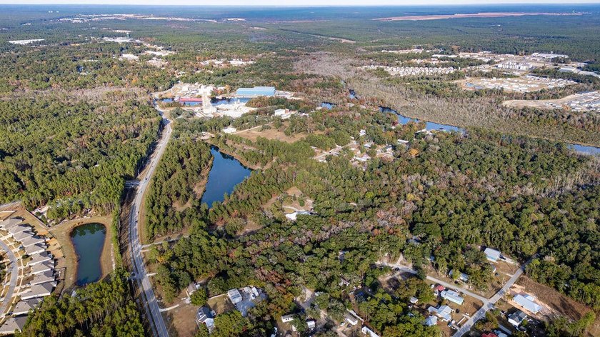 large lot just under an acre. lot comes with one septic tank and - photo 10