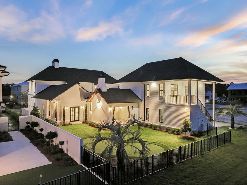 Discover refined coastal living in this stunning custom-designed - photo 32