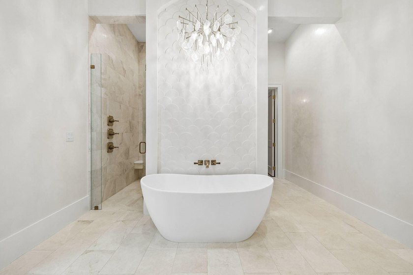 Discover refined coastal living in this stunning custom-designed - photo 50