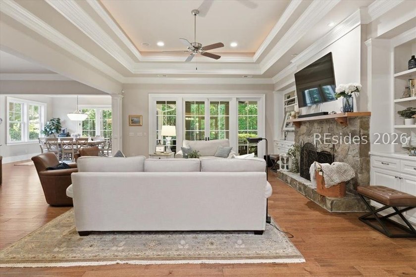 Hampton Lake is a gated community in Bluffton, centered around a - photo 11