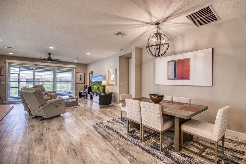 Beautifully upgraded 2023 Bimini Model lakefront home featuring - photo 11