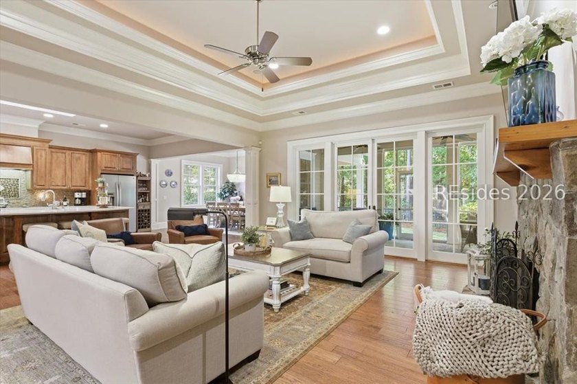 Hampton Lake is a gated community in Bluffton, centered around a - photo 13