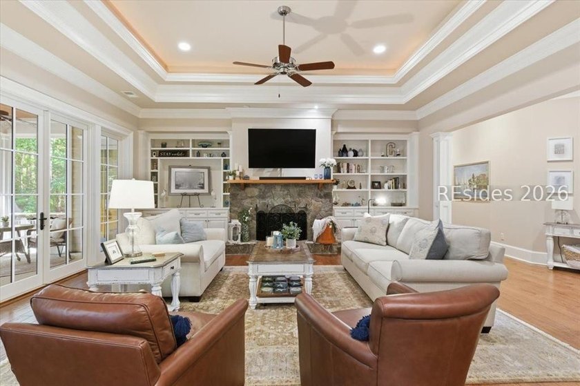 Hampton Lake is a gated community in Bluffton, centered around a - photo 14