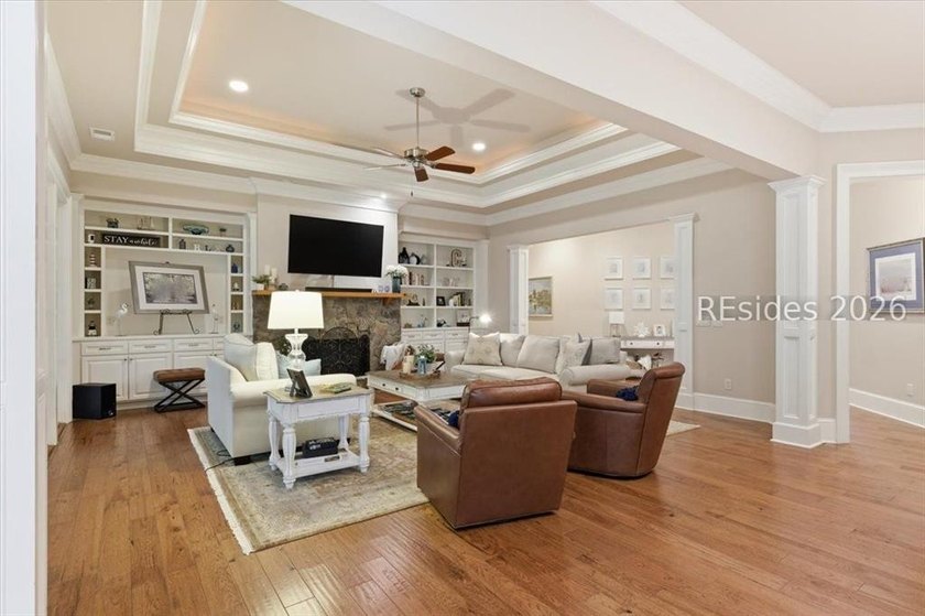 Hampton Lake is a gated community in Bluffton, centered around a - photo 15