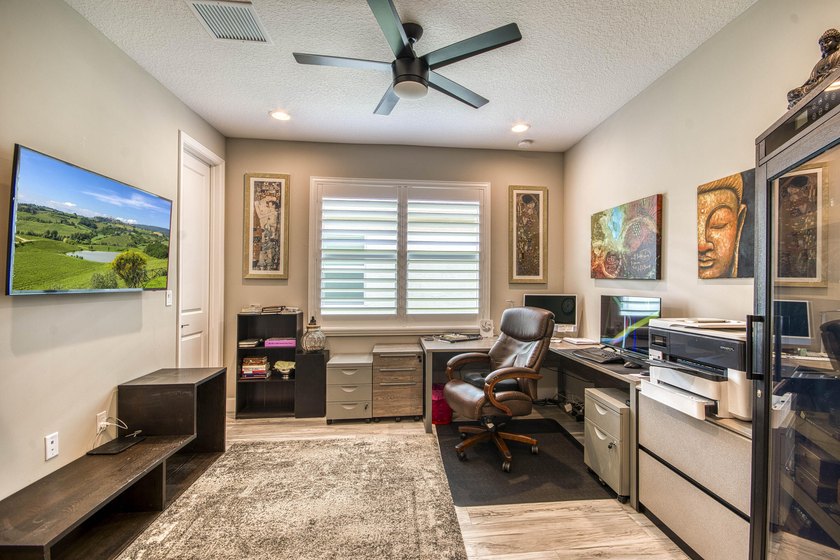 Beautifully upgraded 2023 Bimini Model lakefront home featuring - photo 17