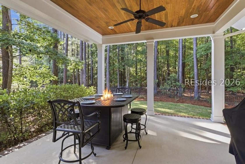 Hampton Lake is a gated community in Bluffton, centered around a - photo 21