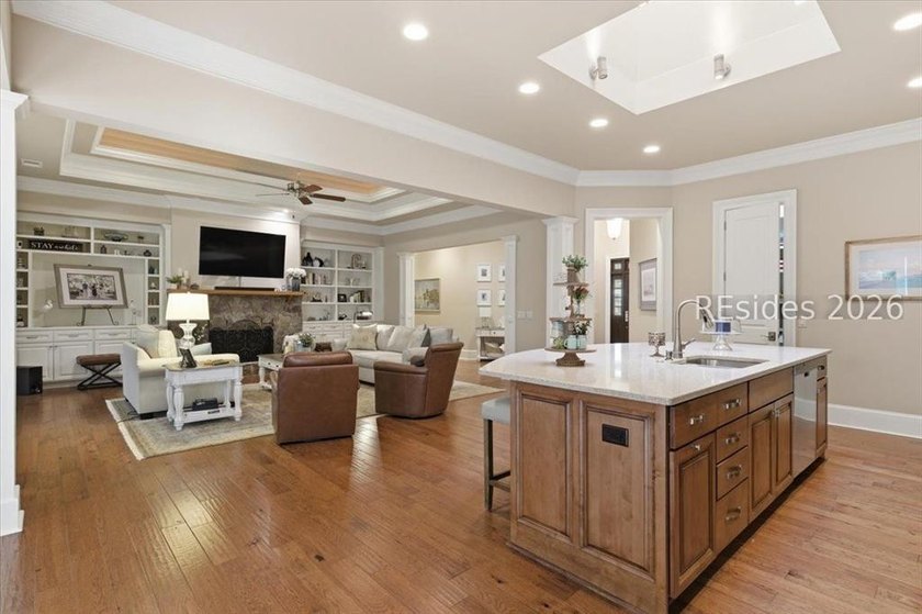 Hampton Lake is a gated community in Bluffton, centered around a - photo 24
