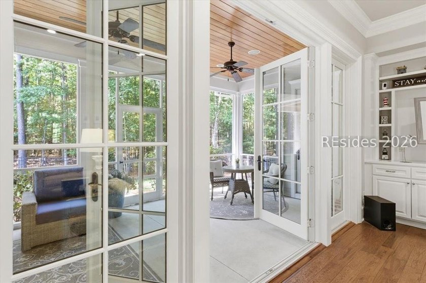 Hampton Lake is a gated community in Bluffton, centered around a - photo 25