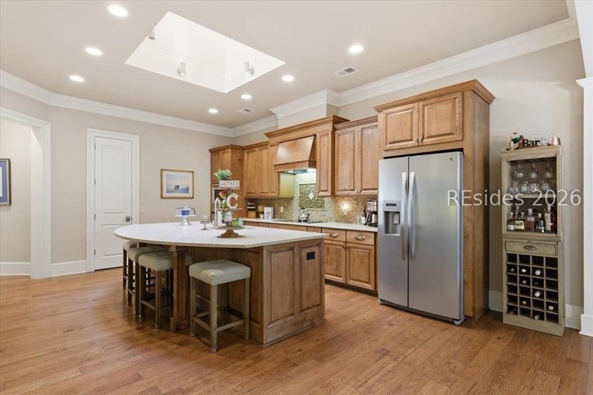Hampton Lake is a gated community in Bluffton, centered around a - photo 34