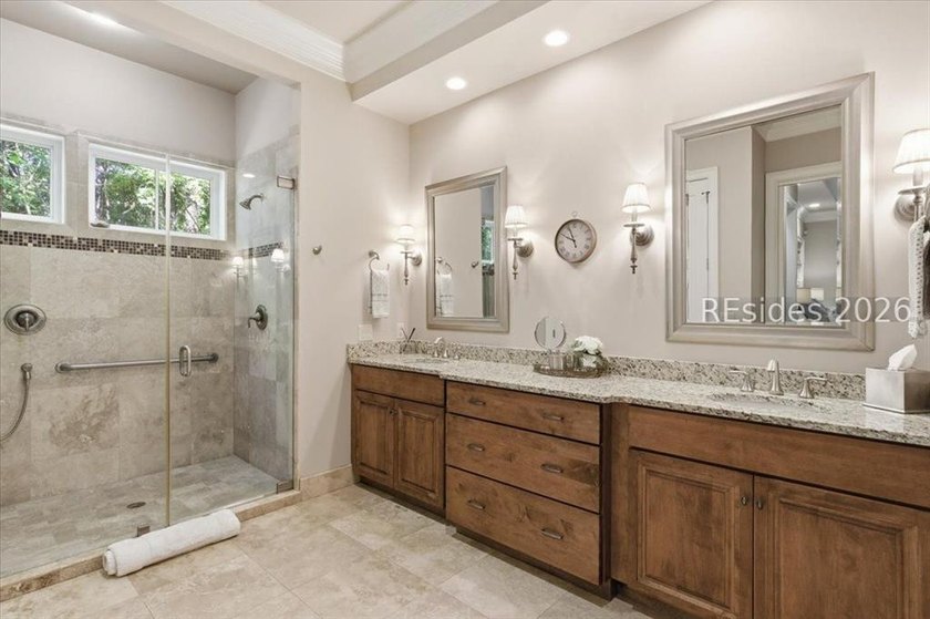 Hampton Lake is a gated community in Bluffton, centered around a - photo 43