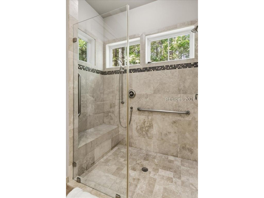 Hampton Lake is a gated community in Bluffton, centered around a - photo 45