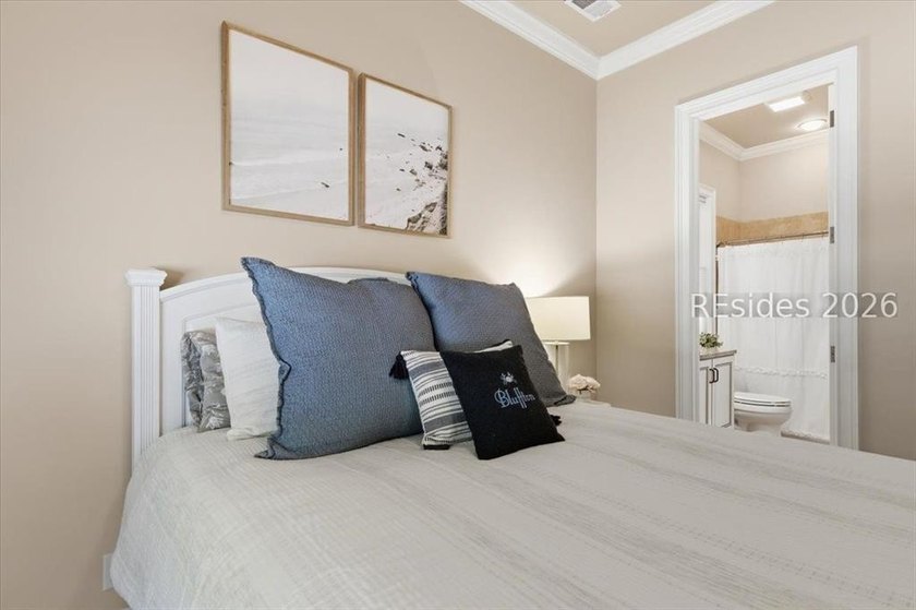 Hampton Lake is a gated community in Bluffton, centered around a - photo 50