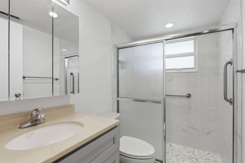 This highly updated two bedroom, two bath first floor end Unit - photo 16