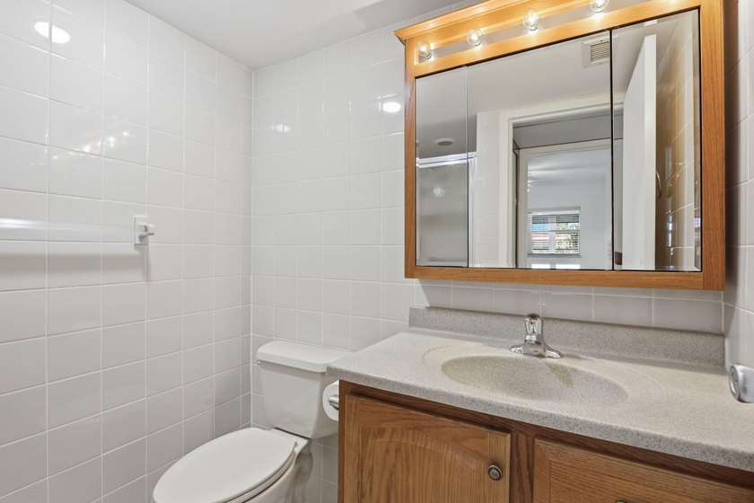 This highly updated two bedroom, two bath first floor end Unit - photo 18