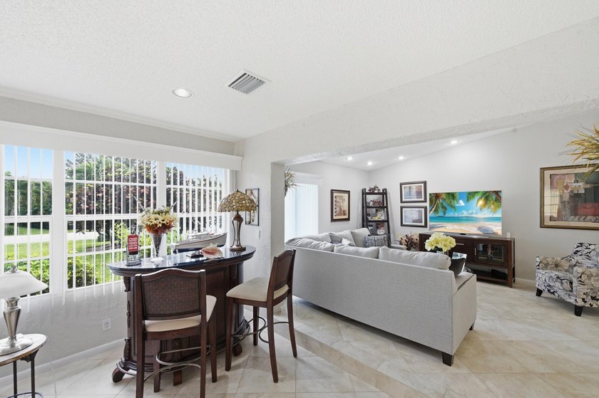 Nestled in the sought-after Villas of Green Glen within the - photo 13