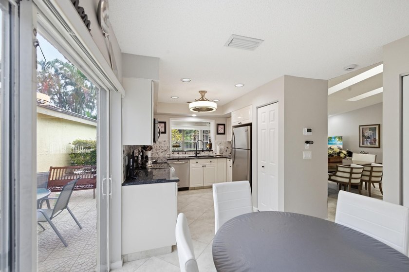 Nestled in the sought-after Villas of Green Glen within the - photo 16