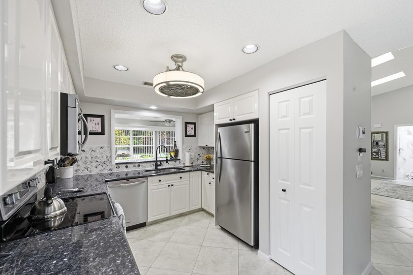 Nestled in the sought-after Villas of Green Glen within the - photo 18