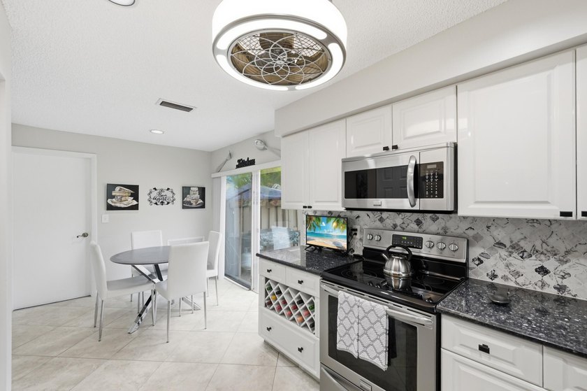 Nestled in the sought-after Villas of Green Glen within the - photo 21