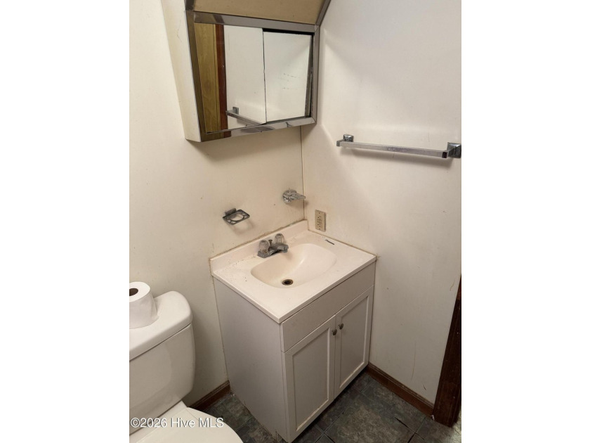Home in town on nice corner lot with front porch! Large eat-in - photo 5
