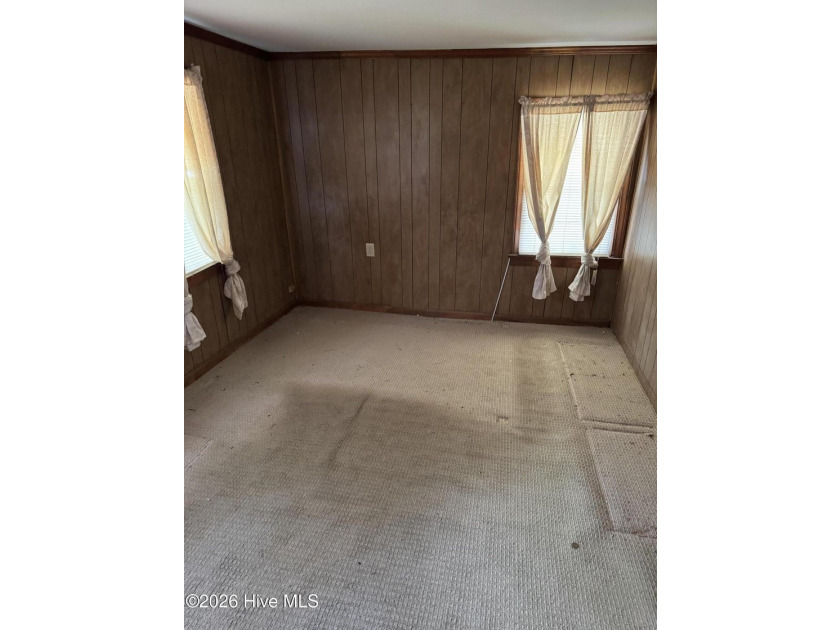 Home in town on nice corner lot with front porch! Large eat-in - photo 9