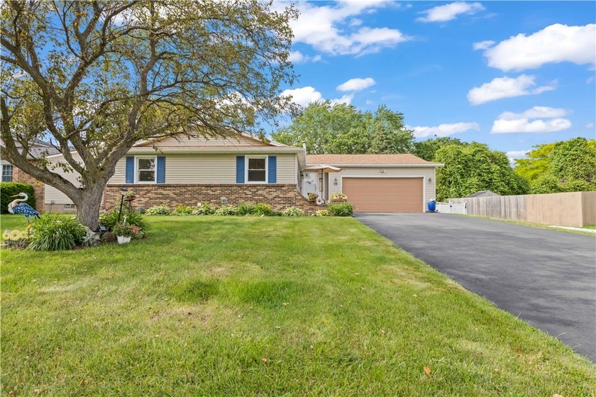Updated 3 bedroom and 1.5 bath ranch offering the ease and - photo 2